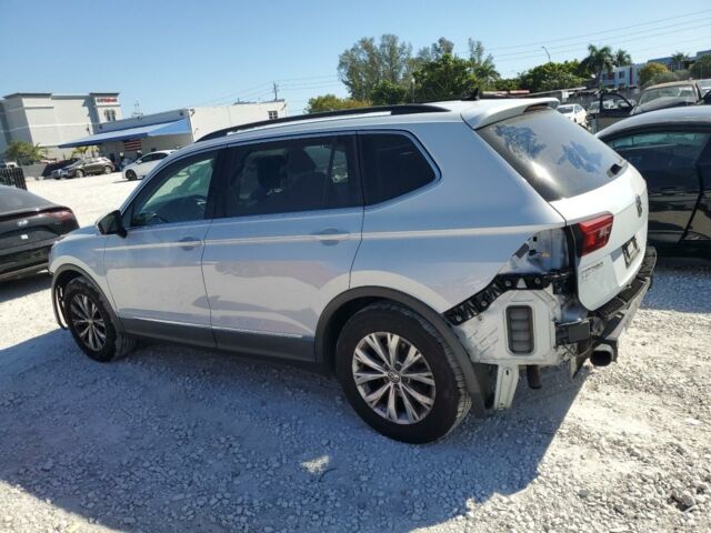 Білий Фольксваген Тігуан, об'ємом двигуна 2 л та пробігом 160 тис. км за 12999 $, фото 3 на Automoto.ua