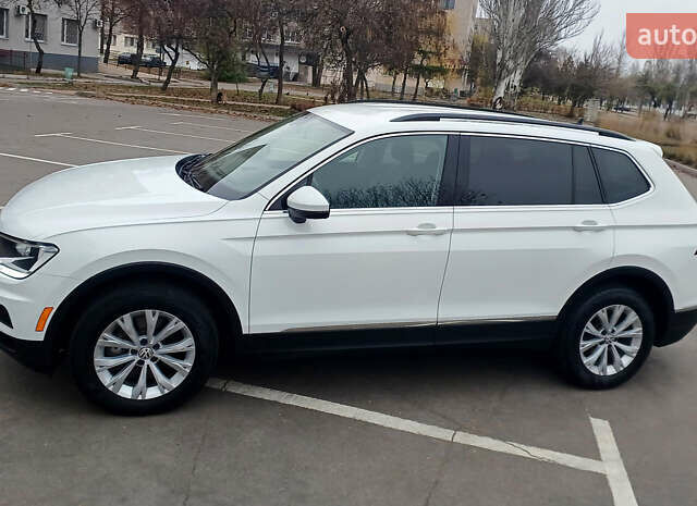 Білий Фольксваген Тігуан, об'ємом двигуна 2 л та пробігом 145 тис. км за 23600 $, фото 2 на Automoto.ua
