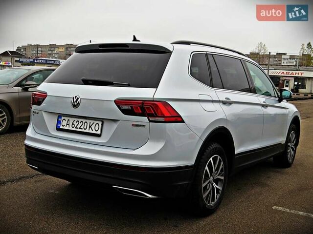 Білий Фольксваген Тігуан, об'ємом двигуна 2 л та пробігом 110 тис. км за 17800 $, фото 2 на Automoto.ua
