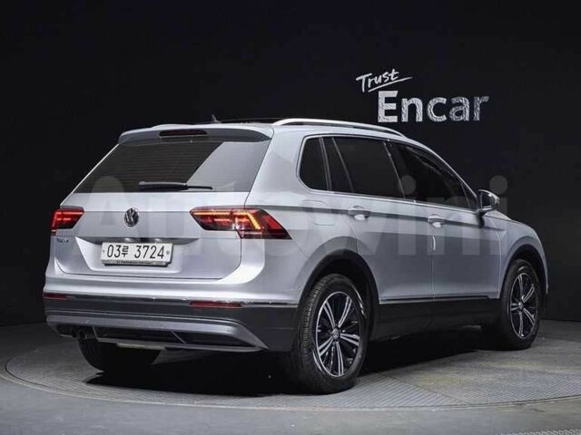 Белый Фольксваген Тигуан, объемом двигателя 2 л и пробегом 57 тыс. км за 16200 $, фото 3 на Automoto.ua