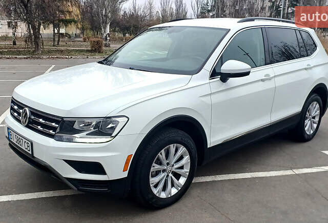 Білий Фольксваген Тігуан, об'ємом двигуна 2 л та пробігом 145 тис. км за 23600 $, фото 12 на Automoto.ua