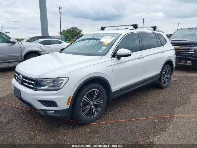 Белый Фольксваген Тигуан, объемом двигателя 2 л и пробегом 72 тыс. км за 4800 $, фото 1 на Automoto.ua