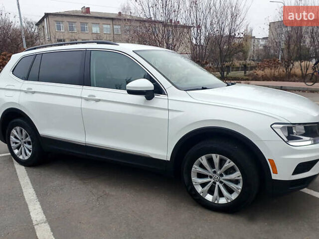 Білий Фольксваген Тігуан, об'ємом двигуна 2 л та пробігом 145 тис. км за 23600 $, фото 6 на Automoto.ua