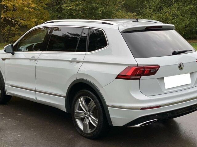 Білий Фольксваген Тігуан, об'ємом двигуна 2 л та пробігом 96 тис. км за 10000 $, фото 5 на Automoto.ua