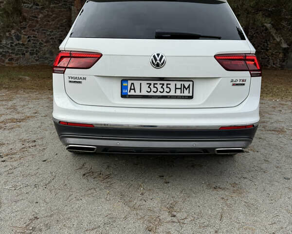 Білий Фольксваген Тігуан, об'ємом двигуна 1.98 л та пробігом 180 тис. км за 28700 $, фото 5 на Automoto.ua