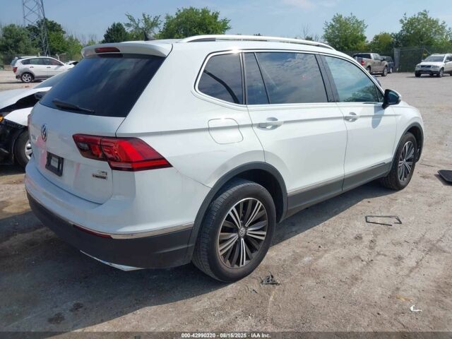 Белый Фольксваген Тигуан, объемом двигателя 2 л и пробегом 193 тыс. км за 13200 $, фото 3 на Automoto.ua