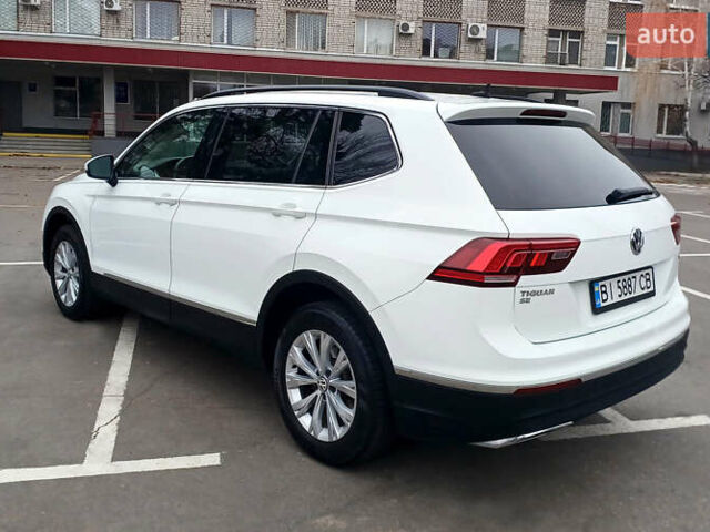 Білий Фольксваген Тігуан, об'ємом двигуна 2 л та пробігом 145 тис. км за 23600 $, фото 13 на Automoto.ua