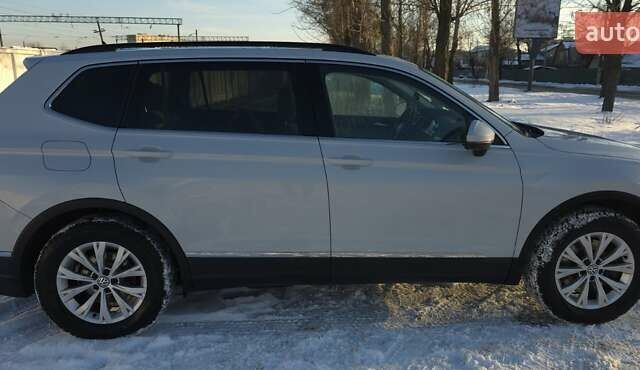 Білий Фольксваген Тігуан, об'ємом двигуна 2 л та пробігом 95 тис. км за 22300 $, фото 12 на Automoto.ua