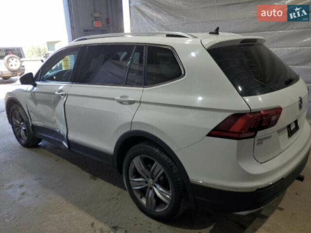 Белый Фольксваген Тигуан, объемом двигателя 1.98 л и пробегом 124 тыс. км за 15000 $, фото 2 на Automoto.ua