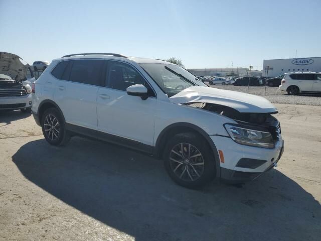 Білий Фольксваген Тігуан, об'ємом двигуна 2 л та пробігом 112 тис. км за 11000 $, фото 2 на Automoto.ua