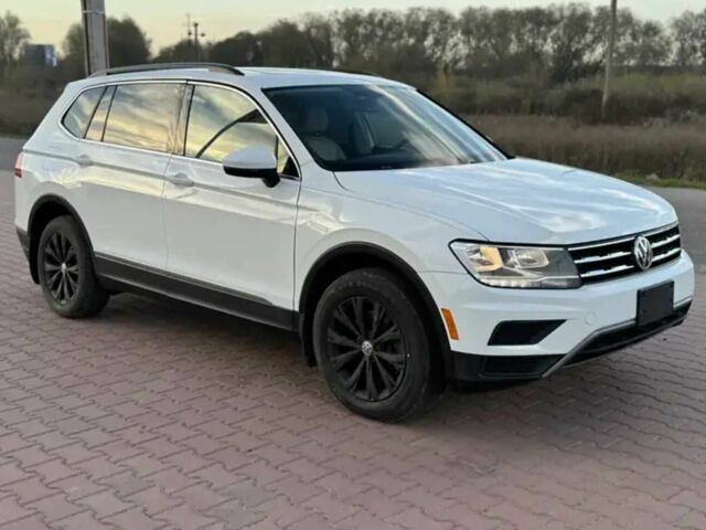 Білий Фольксваген Тігуан, об'ємом двигуна 2 л та пробігом 70 тис. км за 14000 $, фото 2 на Automoto.ua