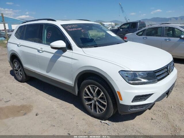 Білий Фольксваген Тігуан, об'ємом двигуна 2 л та пробігом 98 тис. км за 13200 $, фото 1 на Automoto.ua