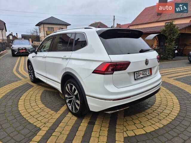Білий Фольксваген Тігуан, об'ємом двигуна 2 л та пробігом 245 тис. км за 28900 $, фото 3 на Automoto.ua