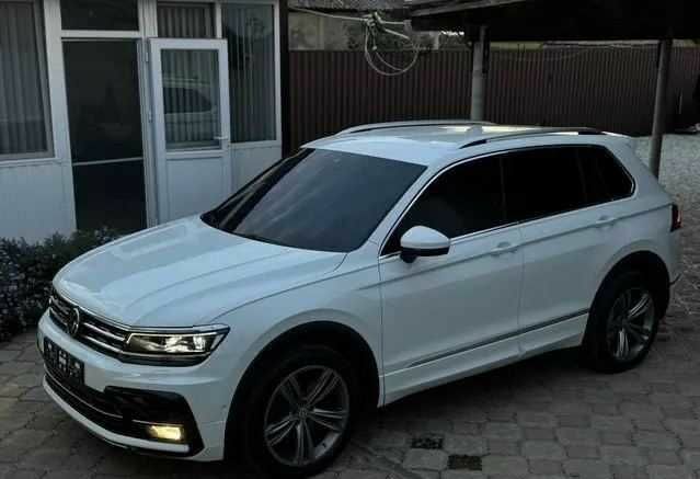 Белый Фольксваген Тигуан, объемом двигателя 2 л и пробегом 90 тыс. км за 18000 $, фото 12 на Automoto.ua