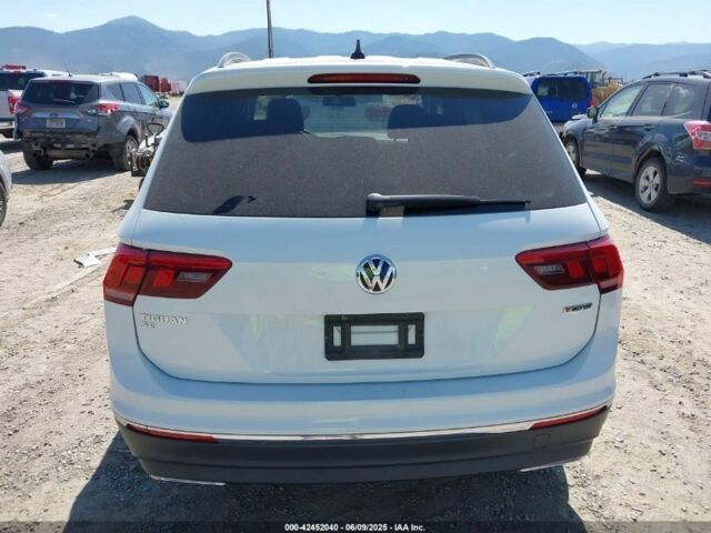 Білий Фольксваген Тігуан, об'ємом двигуна 2 л та пробігом 98 тис. км за 13200 $, фото 2 на Automoto.ua