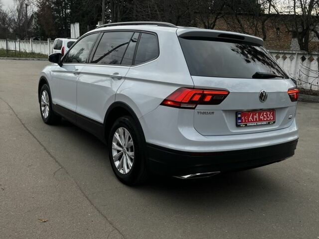 Білий Фольксваген Тігуан, об'ємом двигуна 2 л та пробігом 150 тис. км за 16800 $, фото 2 на Automoto.ua