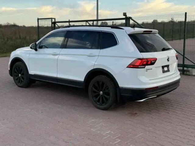 Білий Фольксваген Тігуан, об'ємом двигуна 2 л та пробігом 70 тис. км за 14000 $, фото 5 на Automoto.ua