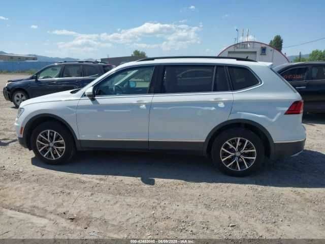 Белый Фольксваген Тигуан, объемом двигателя 2 л и пробегом 65 тыс. км за 6200 $, фото 12 на Automoto.ua