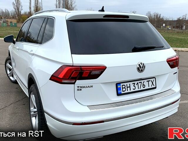 Білий Фольксваген Тігуан, об'ємом двигуна 2 л та пробігом 132 тис. км за 20000 $, фото 2 на Automoto.ua