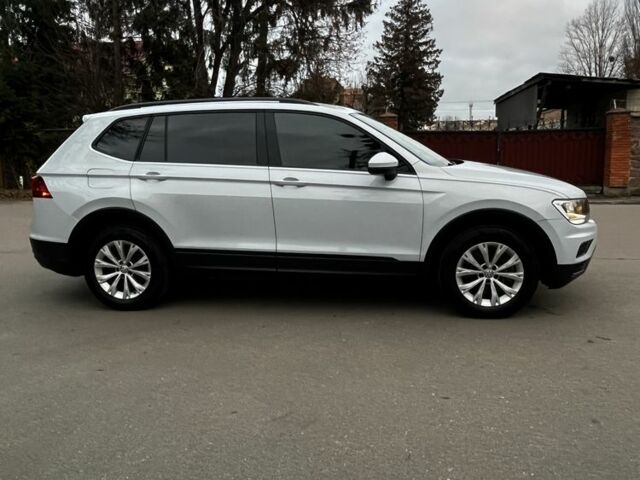 Білий Фольксваген Тігуан, об'ємом двигуна 2 л та пробігом 150 тис. км за 16800 $, фото 1 на Automoto.ua