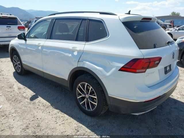 Белый Фольксваген Тигуан, объемом двигателя 2 л и пробегом 65 тыс. км за 6200 $, фото 2 на Automoto.ua