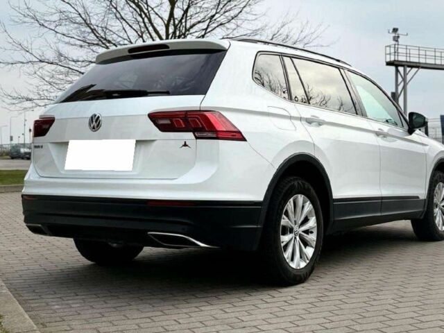 Білий Фольксваген Тігуан, об'ємом двигуна 2 л та пробігом 54 тис. км за 11700 $, фото 2 на Automoto.ua