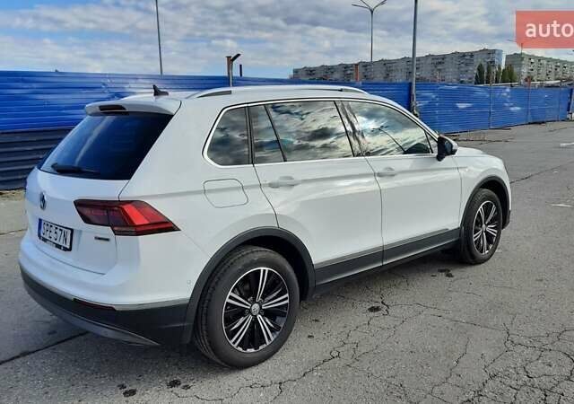 Белый Фольксваген Тигуан, объемом двигателя 1.98 л и пробегом 185 тыс. км за 27500 $, фото 1 на Automoto.ua