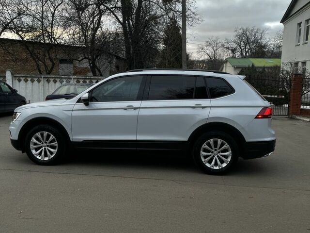 Білий Фольксваген Тігуан, об'ємом двигуна 2 л та пробігом 150 тис. км за 16800 $, фото 3 на Automoto.ua