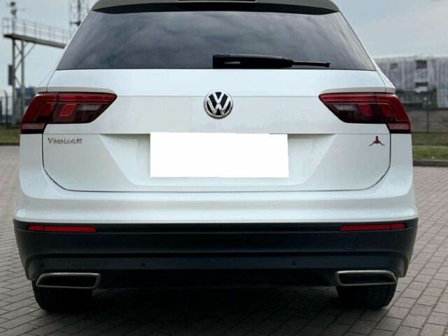 Білий Фольксваген Тігуан, об'ємом двигуна 2 л та пробігом 54 тис. км за 11700 $, фото 1 на Automoto.ua