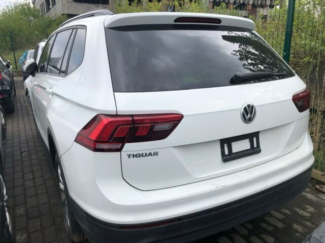 Белый Фольксваген Тигуан, объемом двигателя 2 л и пробегом 100 тыс. км за 8800 $, фото 1 на Automoto.ua