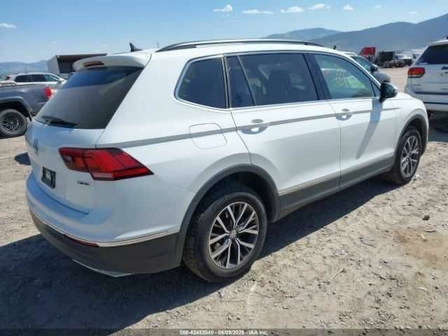 Белый Фольксваген Тигуан, объемом двигателя 2 л и пробегом 65 тыс. км за 6200 $, фото 3 на Automoto.ua