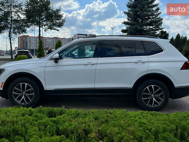 Білий Фольксваген Тігуан, об'ємом двигуна 2 л та пробігом 110 тис. км за 21850 $, фото 3 на Automoto.ua