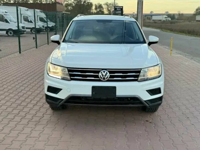 Білий Фольксваген Тігуан, об'ємом двигуна 2 л та пробігом 70 тис. км за 14000 $, фото 1 на Automoto.ua