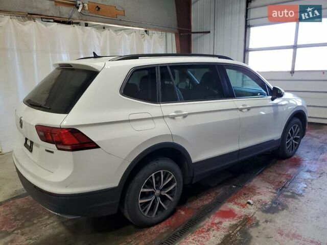 Белый Фольксваген Тигуан, объемом двигателя 2 л и пробегом 150 тыс. км за 4100 $, фото 2 на Automoto.ua