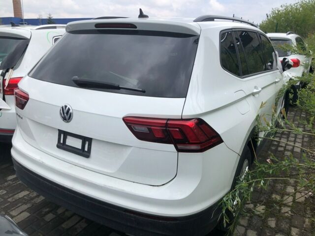 Белый Фольксваген Тигуан, объемом двигателя 2 л и пробегом 100 тыс. км за 8800 $, фото 4 на Automoto.ua