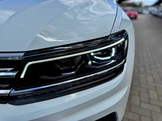 Білий Фольксваген Тігуан, об'ємом двигуна 2 л та пробігом 105 тис. км за 19500 $, фото 3 на Automoto.ua