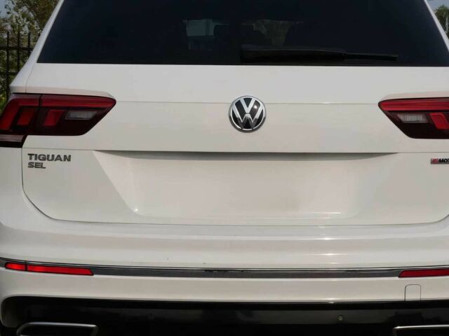 Белый Фольксваген Тигуан, объемом двигателя 2 л и пробегом 48 тыс. км за 5600 $, фото 4 на Automoto.ua