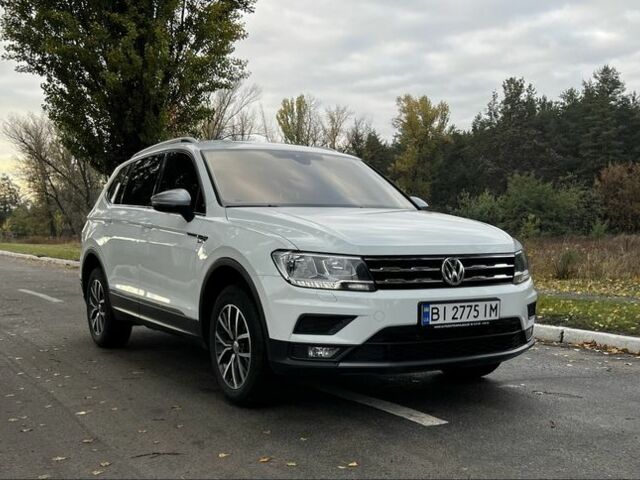 Білий Фольксваген Тігуан, об'ємом двигуна 2 л та пробігом 203 тис. км за 24500 $, фото 1 на Automoto.ua