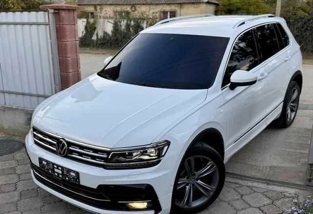 Белый Фольксваген Тигуан, объемом двигателя 2 л и пробегом 90 тыс. км за 18000 $, фото 2 на Automoto.ua