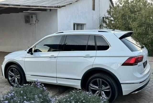 Белый Фольксваген Тигуан, объемом двигателя 2 л и пробегом 90 тыс. км за 18000 $, фото 5 на Automoto.ua