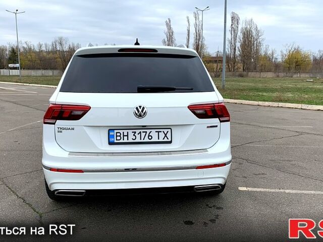 Білий Фольксваген Тігуан, об'ємом двигуна 2 л та пробігом 132 тис. км за 20000 $, фото 4 на Automoto.ua
