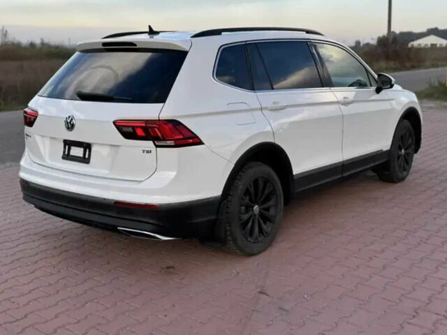 Білий Фольксваген Тігуан, об'ємом двигуна 2 л та пробігом 70 тис. км за 14000 $, фото 8 на Automoto.ua