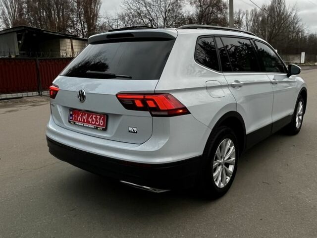 Білий Фольксваген Тігуан, об'ємом двигуна 2 л та пробігом 150 тис. км за 16800 $, фото 4 на Automoto.ua