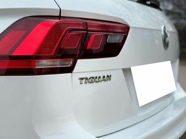 Білий Фольксваген Тігуан, об'ємом двигуна 2 л та пробігом 54 тис. км за 11700 $, фото 5 на Automoto.ua