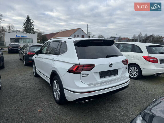 Белый Фольксваген Тигуан, объемом двигателя 1.98 л и пробегом 234 тыс. км за 32500 $, фото 1 на Automoto.ua