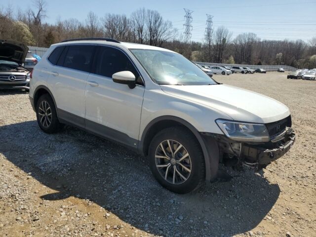 Білий Фольксваген Тігуан, об'ємом двигуна 2 л та пробігом 194 тис. км за 12750 $, фото 2 на Automoto.ua