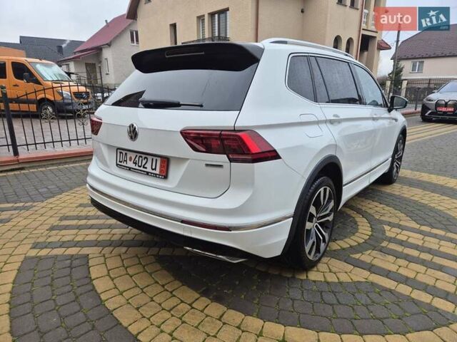 Білий Фольксваген Тігуан, об'ємом двигуна 2 л та пробігом 245 тис. км за 28900 $, фото 2 на Automoto.ua