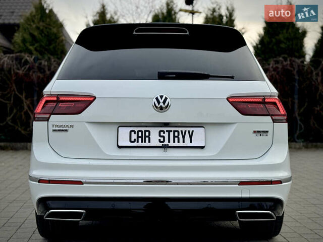 Білий Фольксваген Тігуан, об'ємом двигуна 2 л та пробігом 186 тис. км за 29999 $, фото 28 на Automoto.ua