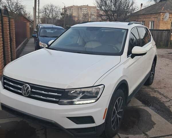 Білий Фольксваген Тігуан, об'ємом двигуна 2 л та пробігом 142 тис. км за 17200 $, фото 2 на Automoto.ua