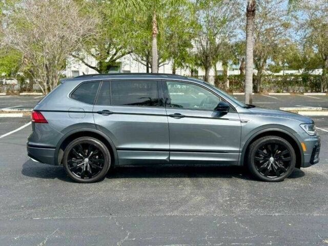 Білий Фольксваген Тігуан, об'ємом двигуна 2 л та пробігом 101 тис. км за 5200 $, фото 4 на Automoto.ua